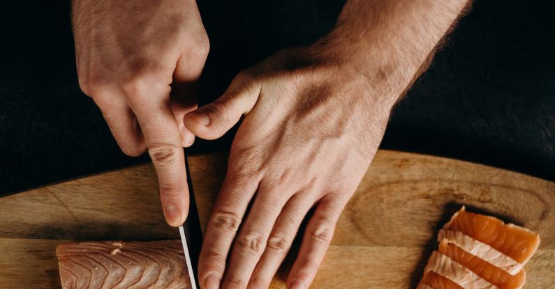 Heuristic Methods - Person Holding Silver Bread Knife