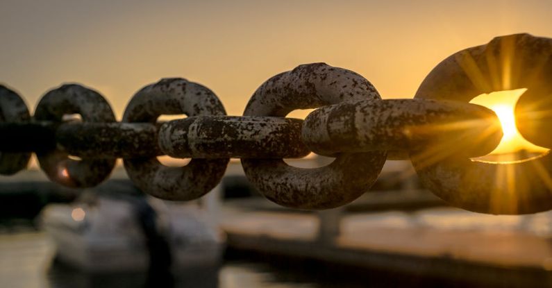 Value Chain - Selective Focus Photoraphy of Chains during Golden Hour