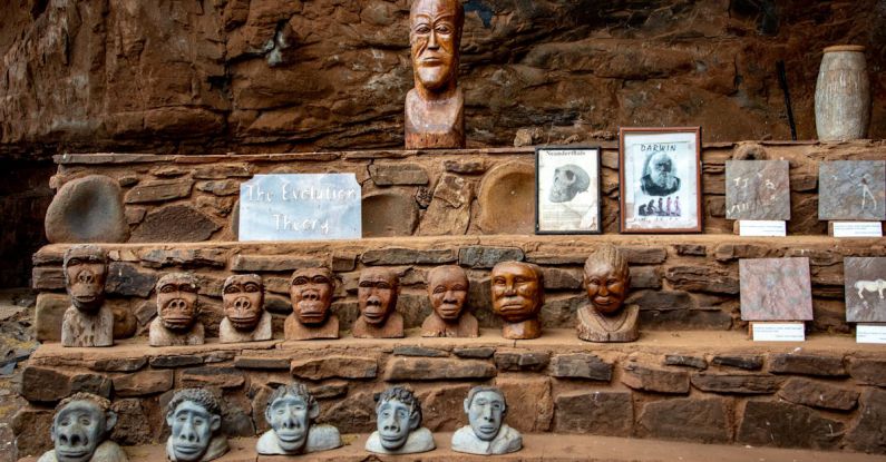 McGregor's Theory - Head Carvings on a Clay and Stone Stairs