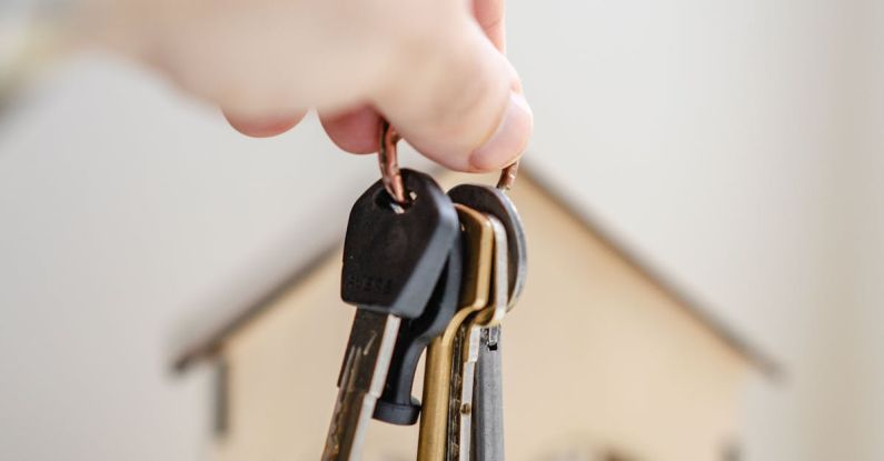 Key Ratios - Person with keys for real estate
