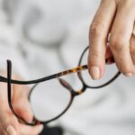 DuPont Analysis - Person Holding Brown Framed Eyeglasses