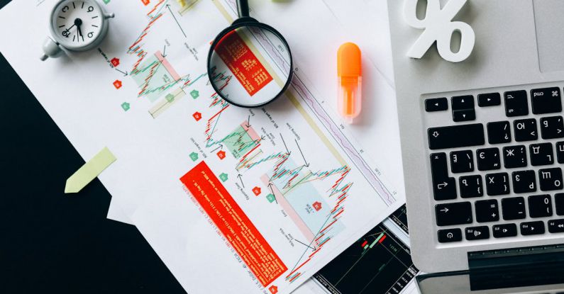 Credit Risk Analysis - Magnifying Glass on White Paper