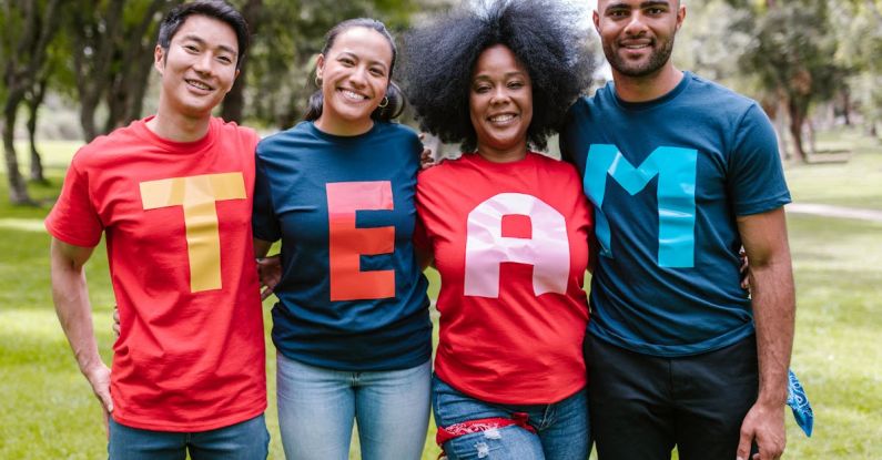 Cultural Diversity - Group of People Wearing Shirts Spelled Team