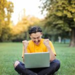 Win-Win Approach - Man Sitting on a Green Grass Field